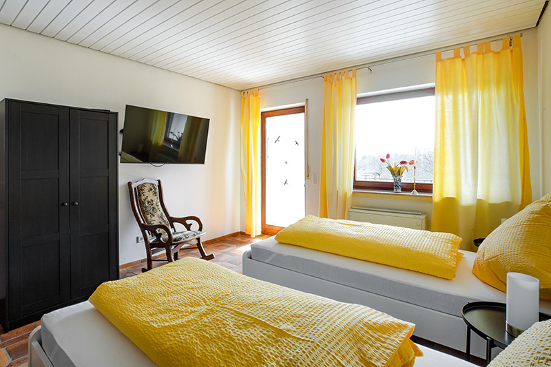 Ferienwohnung Wäller Abendsonne Schlafzimmer mit 2 Einzelbetten