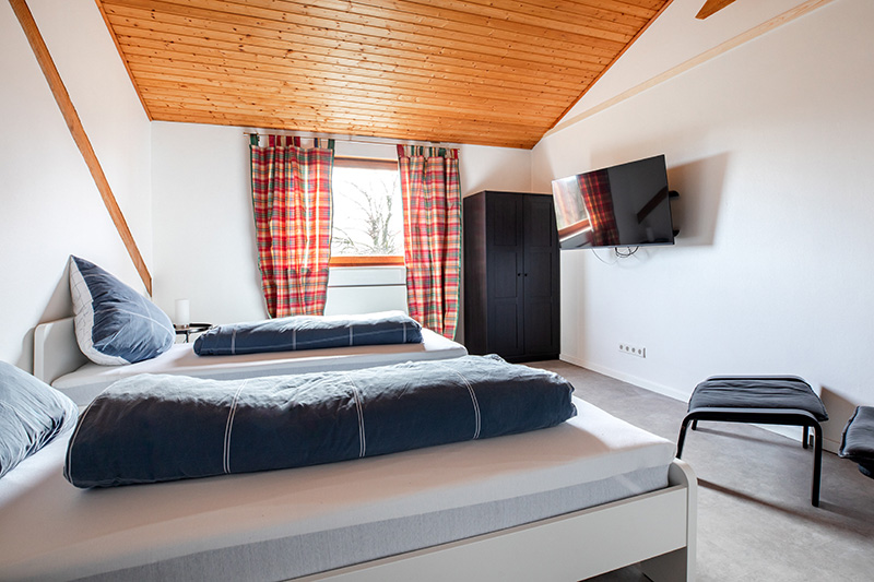 Ferienwohnung Wäller Fernblick Schlafzimmer mit 2 Einzelbetten